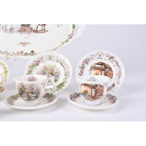 530 - A Royal Doulton Brambly Hedge miniature seasons tea service, comprising a tray, four teacups, four s... 