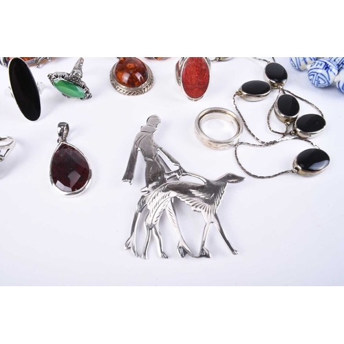 54 - A collection of silver jewellery and costume jewellery, to include; an Art Deco style silver brooch ... 