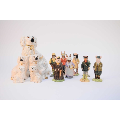 560 - A collection of Beswick models comprising Country Folk Series - Huntsman Fox, model ECF1 Fisherman O... 