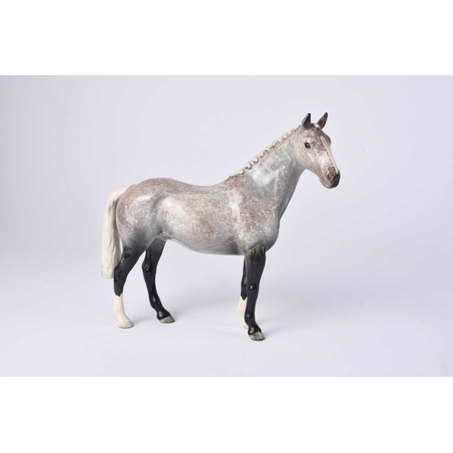 563 - A Beswick model of a Grey Roan Hunter horse, model H260, 20cm high - boxed Condition:Good condition ... 