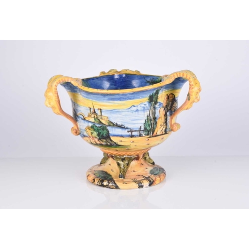 581 - An Italian maiolica Istaoriato style urn vase, possibly Cantagalli, of three-handled form with pinch... 