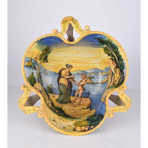 581 - An Italian maiolica Istaoriato style urn vase, possibly Cantagalli, of three-handled form with pinch... 