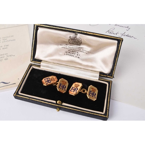 59 - A pair of Elizabeth II 9ct gold and enamel cufflinks, each cufflink with the Royal monogram E II R a... 