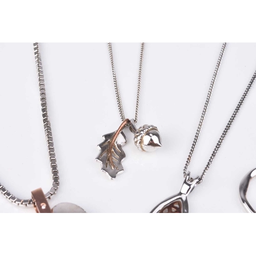 85 - Four Clogau silver pendants on chains, comprising; an oak leaf and acorn pendant, two graduated hoop... 