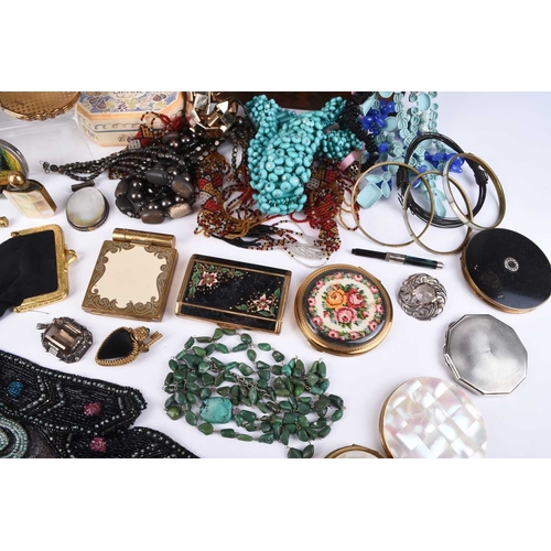 89 - A collection of costume jewellery and compacts, to include; a shaped oval engine turned silver compa... 