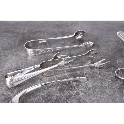 9 - A small collection of silver, comprising; a set of six silver coffee spoons, Birmingham 1943, a pair... 