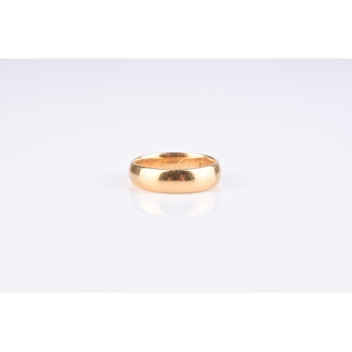 91 - An Edwardian 18ct gold wedding band, hallmarked Glasgow 1901, the interior engraved 'J.P.M & R.B.L 1... 