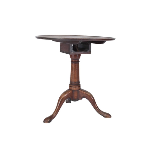 41 - A George II mahogany tripod table Circa 1745-60, the circular dished top pivoting on a birdcage plat... 