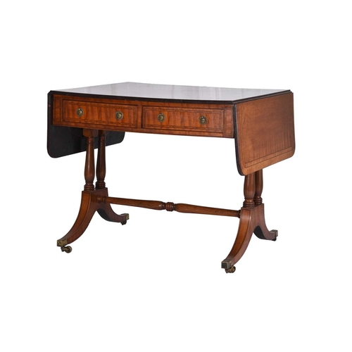 48 - A George III inlaid satinwood sofa table The rosewood banded rectangular top with reeded edge, havin... 