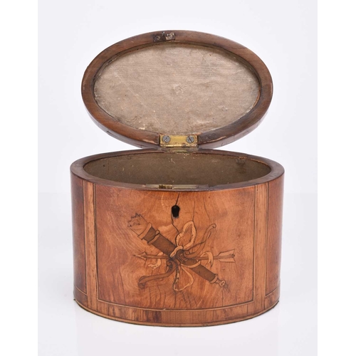 50 - A Regency inlaid walnut tea caddy Of oval form, inlaid with marquetry trophies, swags and patera. 14... 