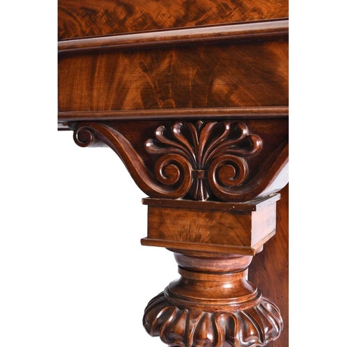 51 - A William IV Irish mahogany breakfront sideboard The flame figured back between turned columns, the ... 