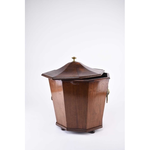 62 - A 19th century mahogany 'pagoda' coal bin and cover Of octagonal tapering form, with brass lion head... 