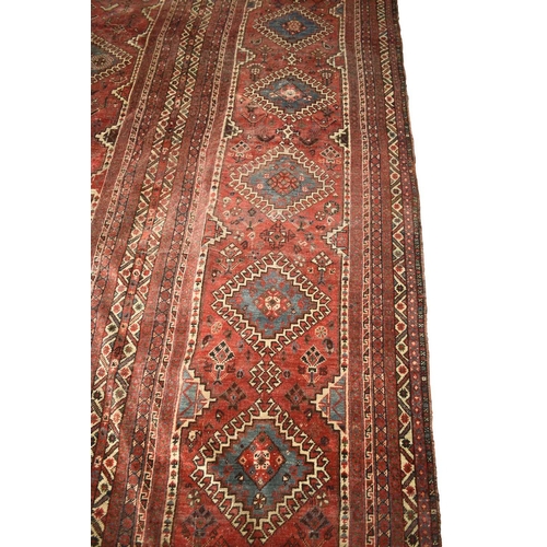 67 - A large Khamseh 'chicken' carpet Late 19th / early 20th century With multiple blue and beige geometr... 