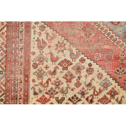 67 - A large Khamseh 'chicken' carpet Late 19th / early 20th century With multiple blue and beige geometr... 