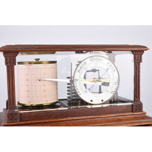 68 - An early 20th Century oak-cased combination barograph and barometer Bearing ivorine plaque reading '... 