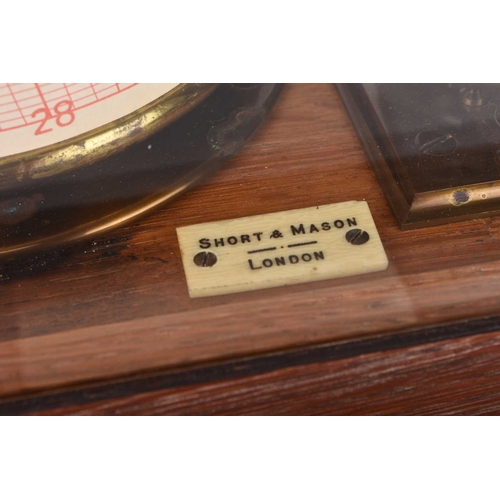 68 - An early 20th Century oak-cased combination barograph and barometer Bearing ivorine plaque reading '... 