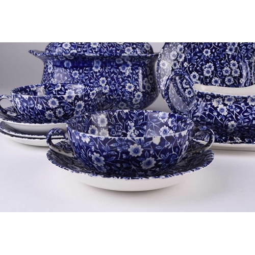 102 - A Burleigh Ironstone 'Calico' dinner service, 20th century, transfer-printed in blue, the service co... 