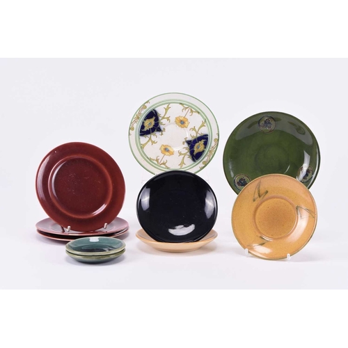 103 - A group of Moorcroft saucers and pin dishes, including a Macintyre & Co saucer, M826, 13.5cm diamete... 