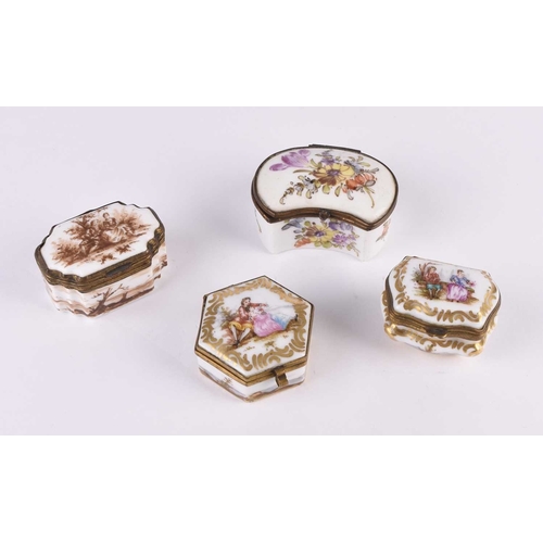 107 - A group of four German porcelain patch or trinket boxes, 19th century, including an example with flo... 