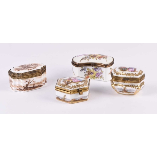 107 - A group of four German porcelain patch or trinket boxes, 19th century, including an example with flo... 