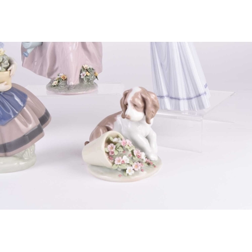 111 - A group of five Lladro figures, comprising 1999 figure 'Wish Come True', model 7676; 'Basket of Love... 