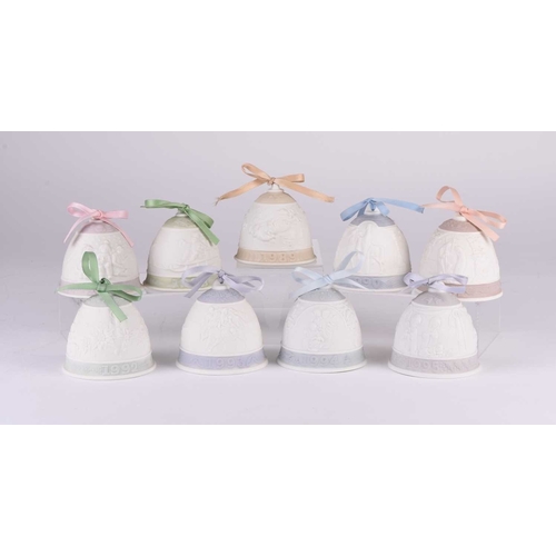 114 - A set of nine Lladro porcelain Christmas Bells, for years 1987-1995 inclusive, contained in their or... 