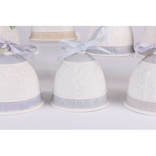 114 - A set of nine Lladro porcelain Christmas Bells, for years 1987-1995 inclusive, contained in their or... 