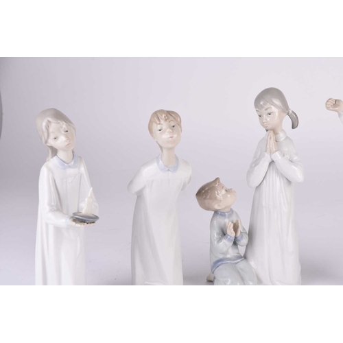 116 - A set of seven Lladro porcelain figures of young boys and girls, model numbers 04779-04874 inclusive... 