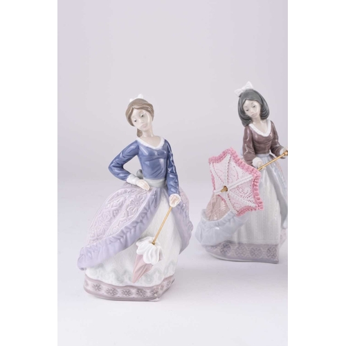 117 - Three Lladro porcelain figures of women with parasols, Dama Sombrilla En Alto Angela (05211), Dama A... 