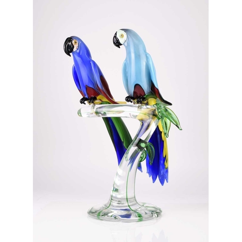 12 - A large Murano glass sculpture of two parrots on a branch modelled by Oscar Zanetti, consisting of t... 