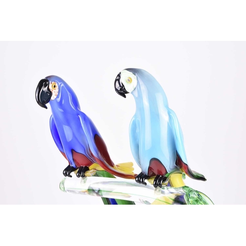 12 - A large Murano glass sculpture of two parrots on a branch modelled by Oscar Zanetti, consisting of t... 