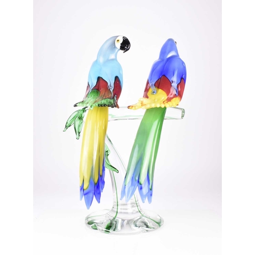 12 - A large Murano glass sculpture of two parrots on a branch modelled by Oscar Zanetti, consisting of t... 