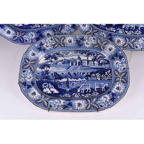 26 - Three English blue and white earthenware meat platters in the 'Waterfall' or 'Riverside Folly' patte... 