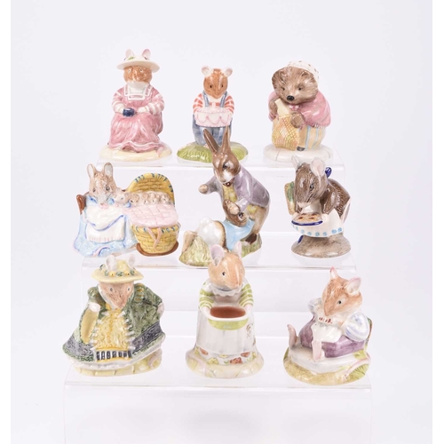 49 - A collection of Beatrix Potter figures, comprising Royal Albert: Old Woman in Shoe; Mrs Rabbit; Gent... 