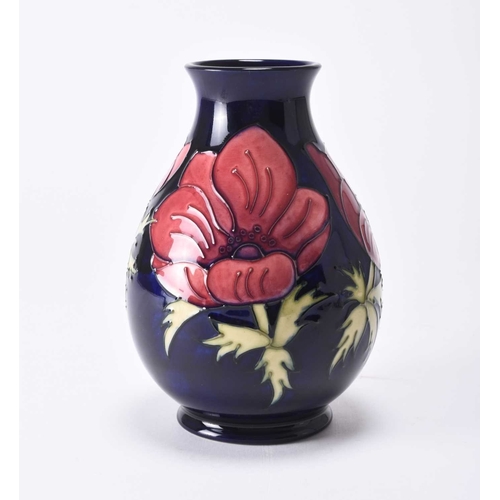 67 - A contemporary limited edition Moorcroft 'Anemone' vase, dated 1995, tubelined with pink and purple ... 