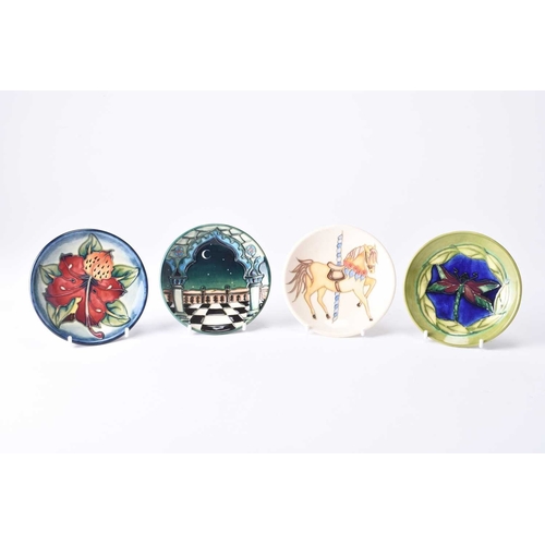 75 - A group of four Moorcroft pin dishes or coasters, 20th/21st century, comprising 'Jumeirah', 'Dragonf... 