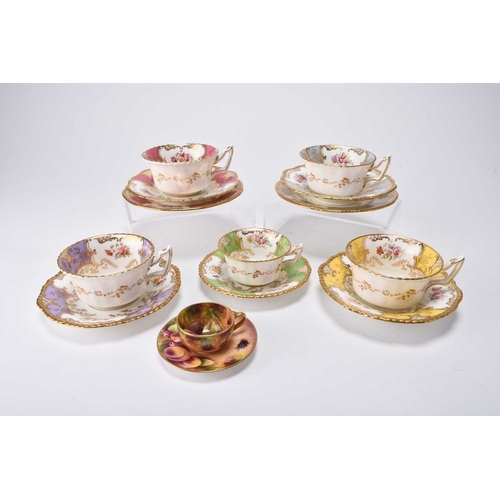 98 - A small group of Coalport batwing teawares, including rarer colourways: a pink trio of teacup, sauce... 