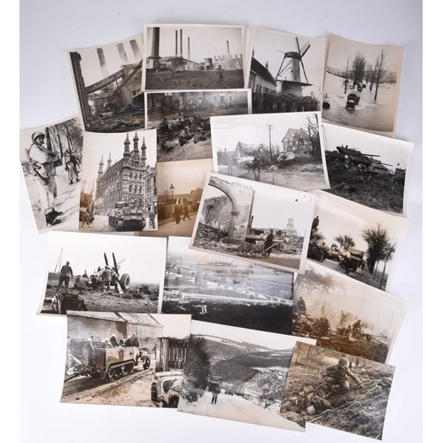 9 - PRESS PHOTOGRAPHY. A mixed lot of approximately 104 Second World War black and white photographs by ... 