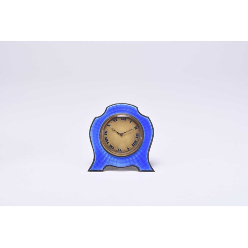 102 - A silver and guilloche enamelled clock retailed by Harrods, marks mark A**, Birmingham 1925, the des... 