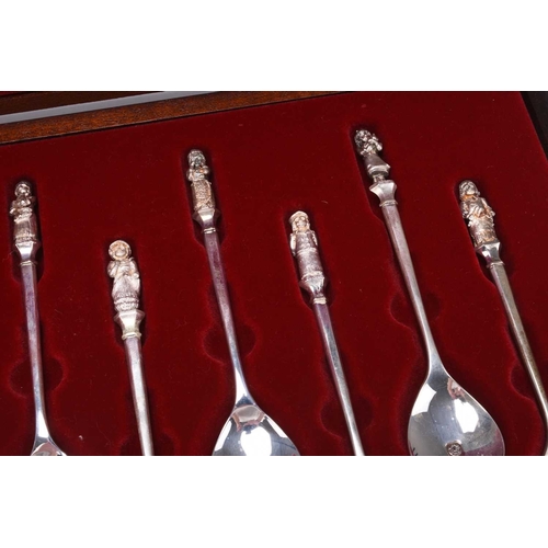 105 - A cased set of figural spoons relating to the 'Monday's Child' rhyme, comprising two sets of six spo... 