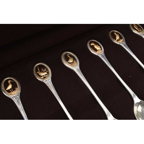 114 - A cased set of commemorative silver spoons for The Royal Society for the Protection of Birds, London... 