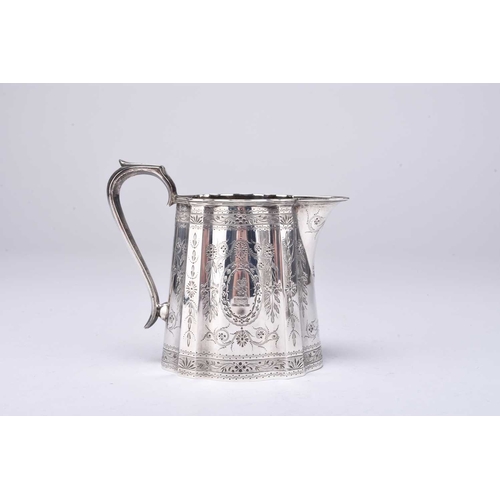 118 - A Victorian matched three piece silver tea service, comprising; a teapot with ivory spacers to the h... 