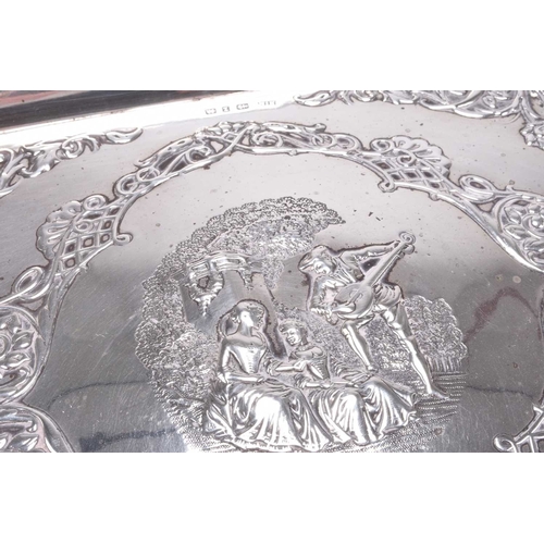 2 - An Edwardian silver dressing table tray, Henry Matthews, Birmingham 1899, of rectangular form with e... 