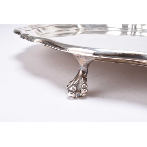 26 - A large silver tray, James Dixon & Sons Ltd, Sheffield 1963, of shaped circular form with pie crust ... 