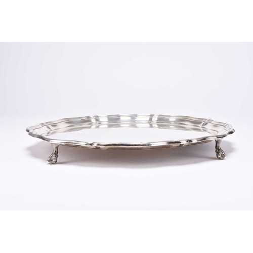 26 - A large silver tray, James Dixon & Sons Ltd, Sheffield 1963, of shaped circular form with pie crust ... 