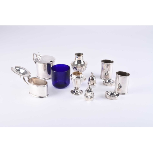 36 - A collection of six silver cruets, comprising; a pair of oval pepperettes and mustard pot, Chester 1... 