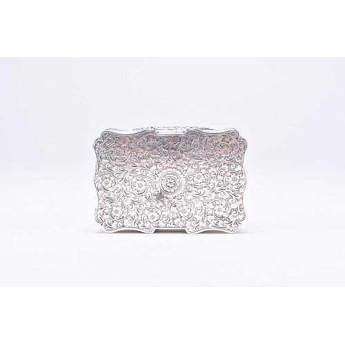 39 - A Victorian silver snuff box, Colen Hewer Cheshire, London 1898, of shaped rectangular form with bri... 