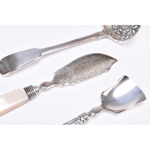 49 - A small collection of silver, comprising; two pairs of silver sugar tongs, a silver sugar sifter spo... 