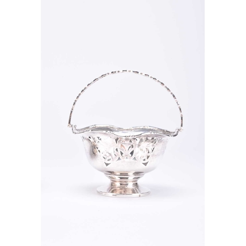 54 - A pair of pedestal silver bon bon dishes, E S Barnsley & Co, Birmingham 1921, each with decorative p... 