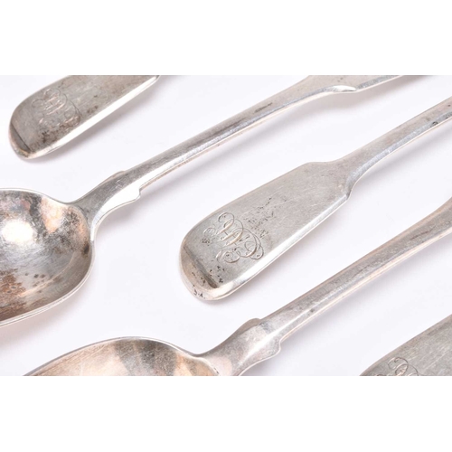 65 - A collection of Fiddle pattern silver flatware, comprising; a set of six George III dessert spoons, ... 